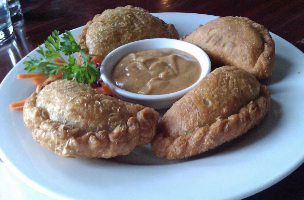 Empanada puffs with a peanut dipping sauce from Indochine Asian Dining Lounge in downtown Tacoma.