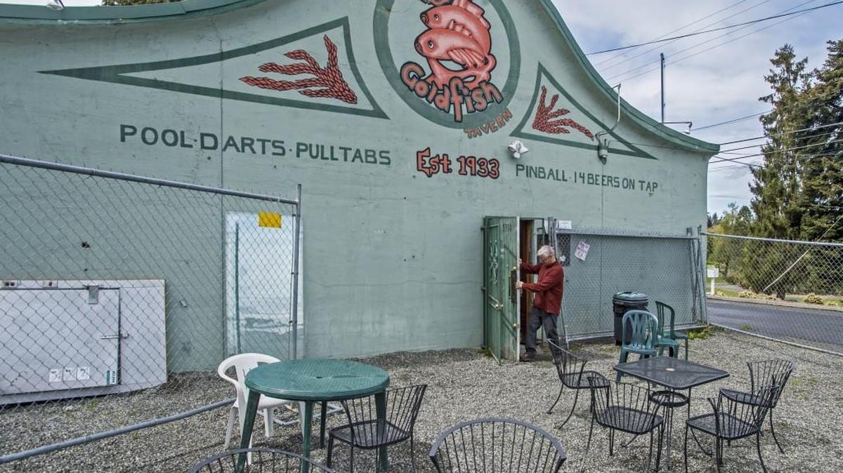 Adam Dopps is shown in April at the old Goldfish Tavern, which he and business partner Corey Webb are turning into The Defiant Goldfish, a restaurant and bar near the entrance to Point Defiance Park.