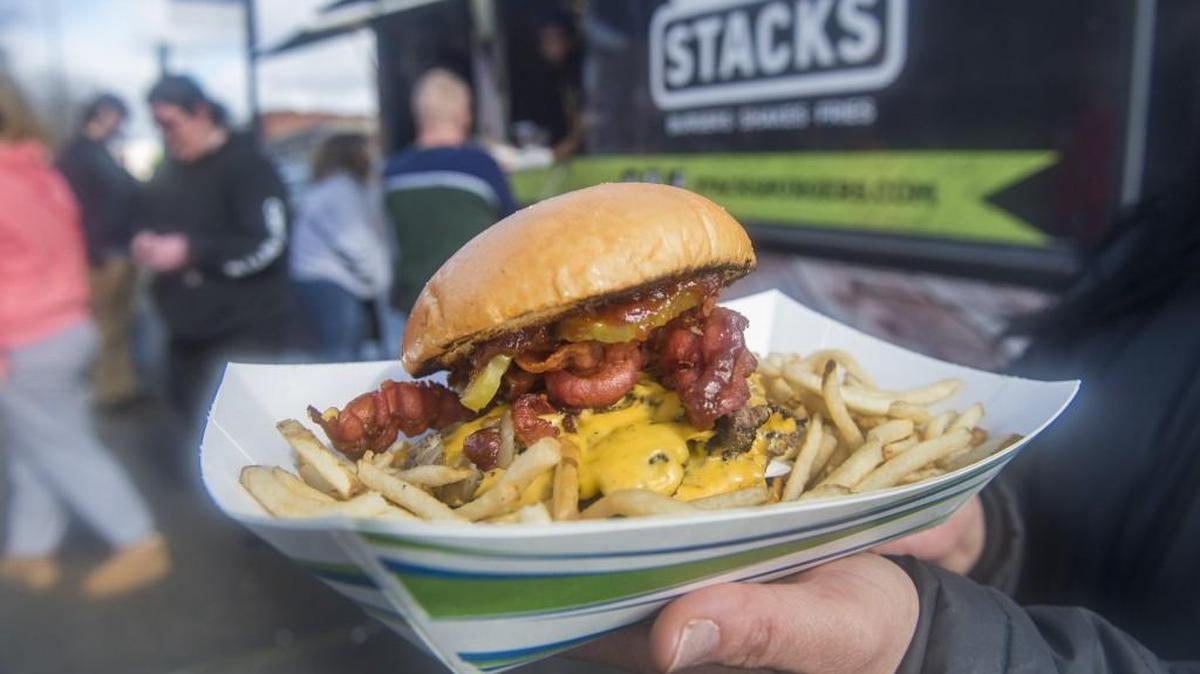 The Beast burger from the Stacks food truck features eight ounces of beef and plenty of bacon. The truck will serve at local food-truck festivals this summer.