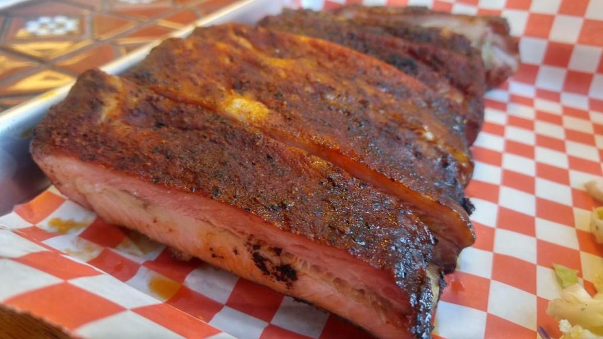 A half slab of ribs from Smokin’ Zee’s BBQ in Lakewood. The restaurant opened Oct. 5.