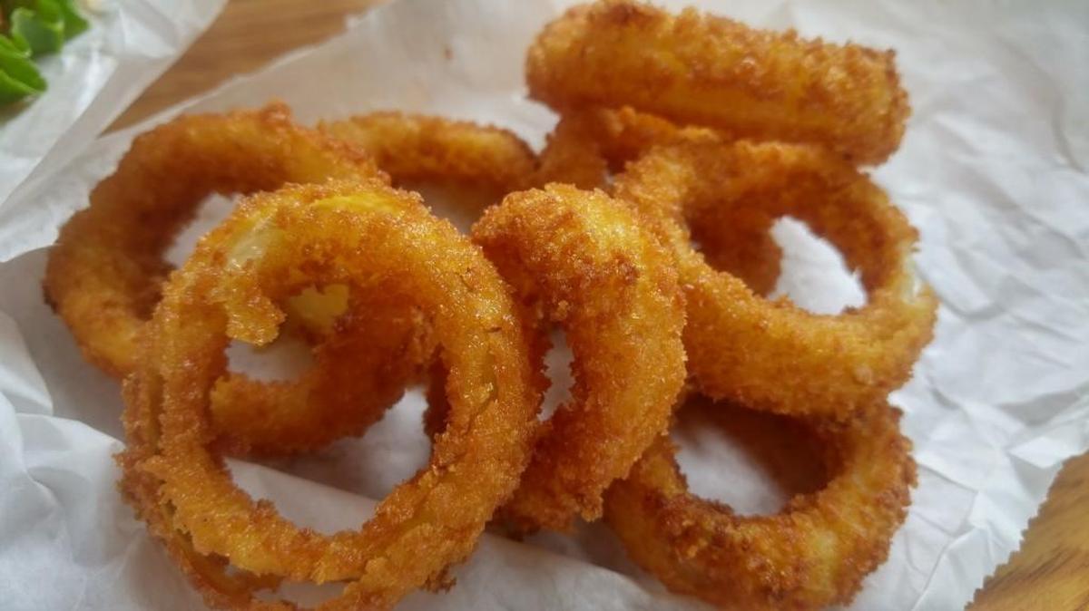 Crunchy, breaded onion rings are made in house at Prime 80/20.