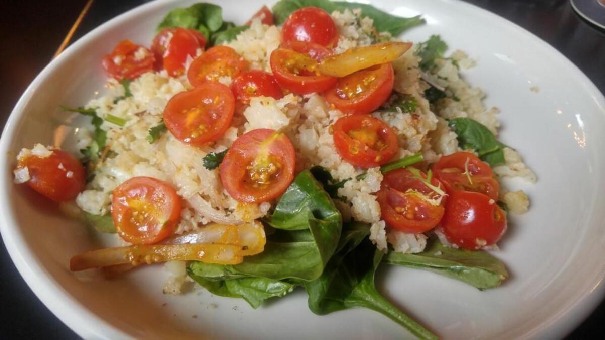 At Pacific Grill, couscous is actually cauliflower that’s been finely chopped so that it mimics the texture of couscous.