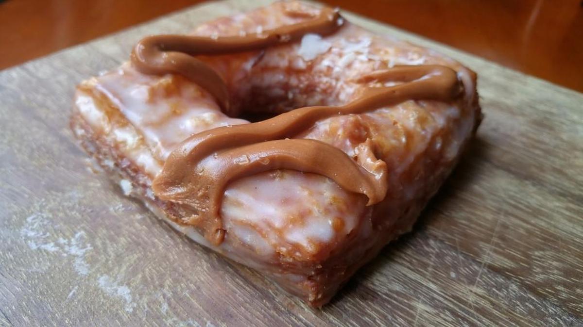 The caramel and sea salt frosted doughsant, a cross between a doughnut and croissant, from the Frederickson Legendary Doughnuts.