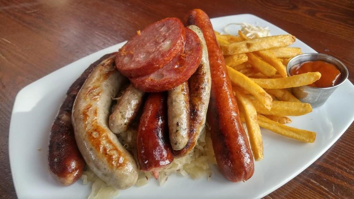 A sausage plate at Rhein Haus Seattle comes with six types of sausage.