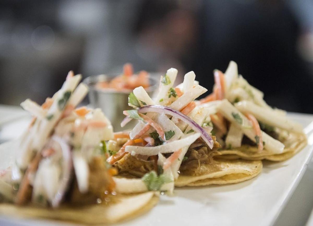 Trinity tacos featuring carne asada, grilled chicken and braised pork at Carne Aqui in Parkland.