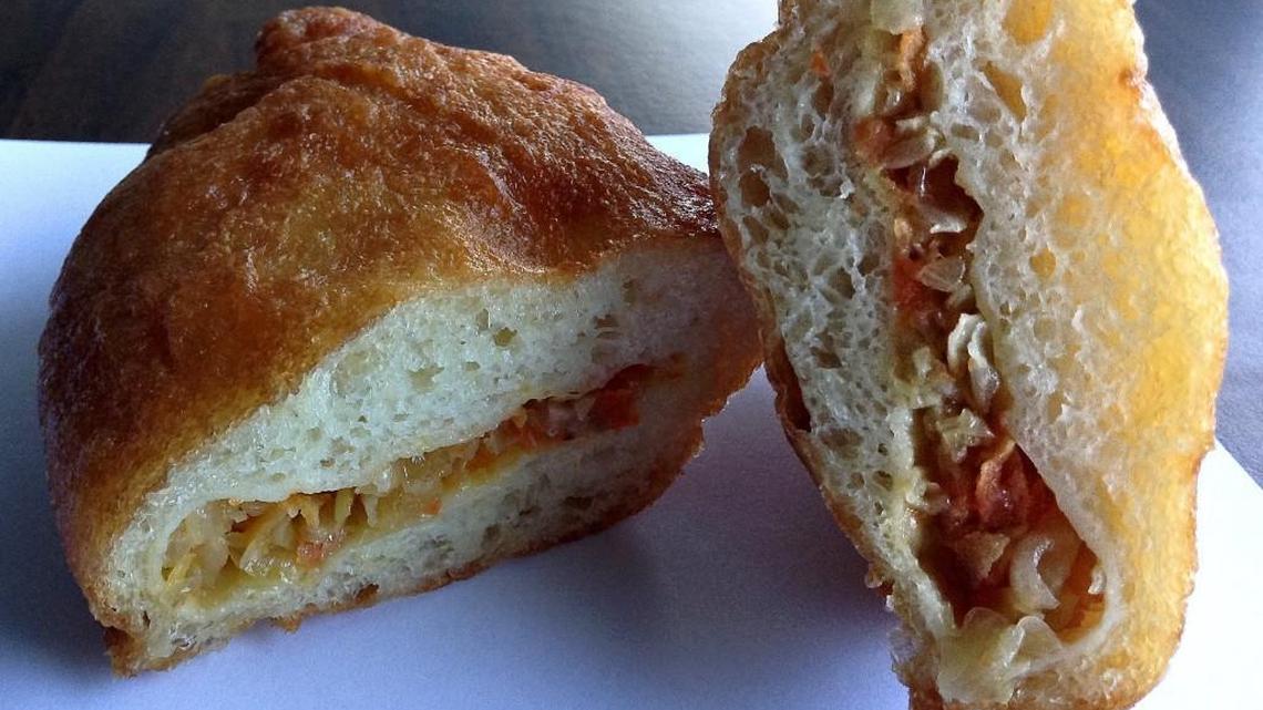 Find at least a half dozen varieties of piroshki in the serve-yourself case at Friendly Foods, an Eastern European grocery store on Center Street in Tacoma. This piroshki is filled with cabbage.