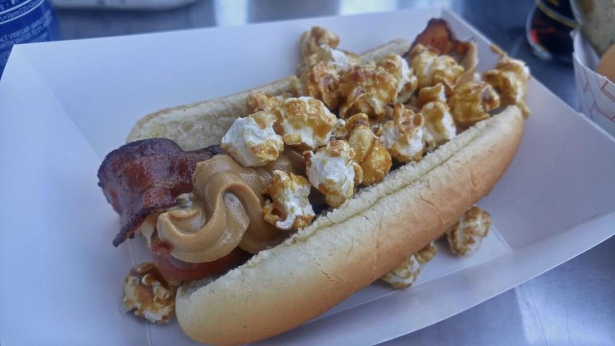 The Cracker Jack, peanut butter and bacon hot dog from The Red Hot stand at Cheney Stadium.