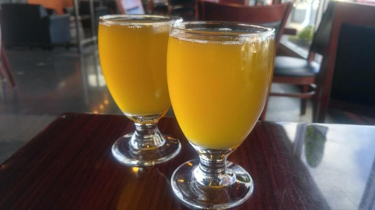 A glass of Everything Nice cider from Fierce County Cider.
