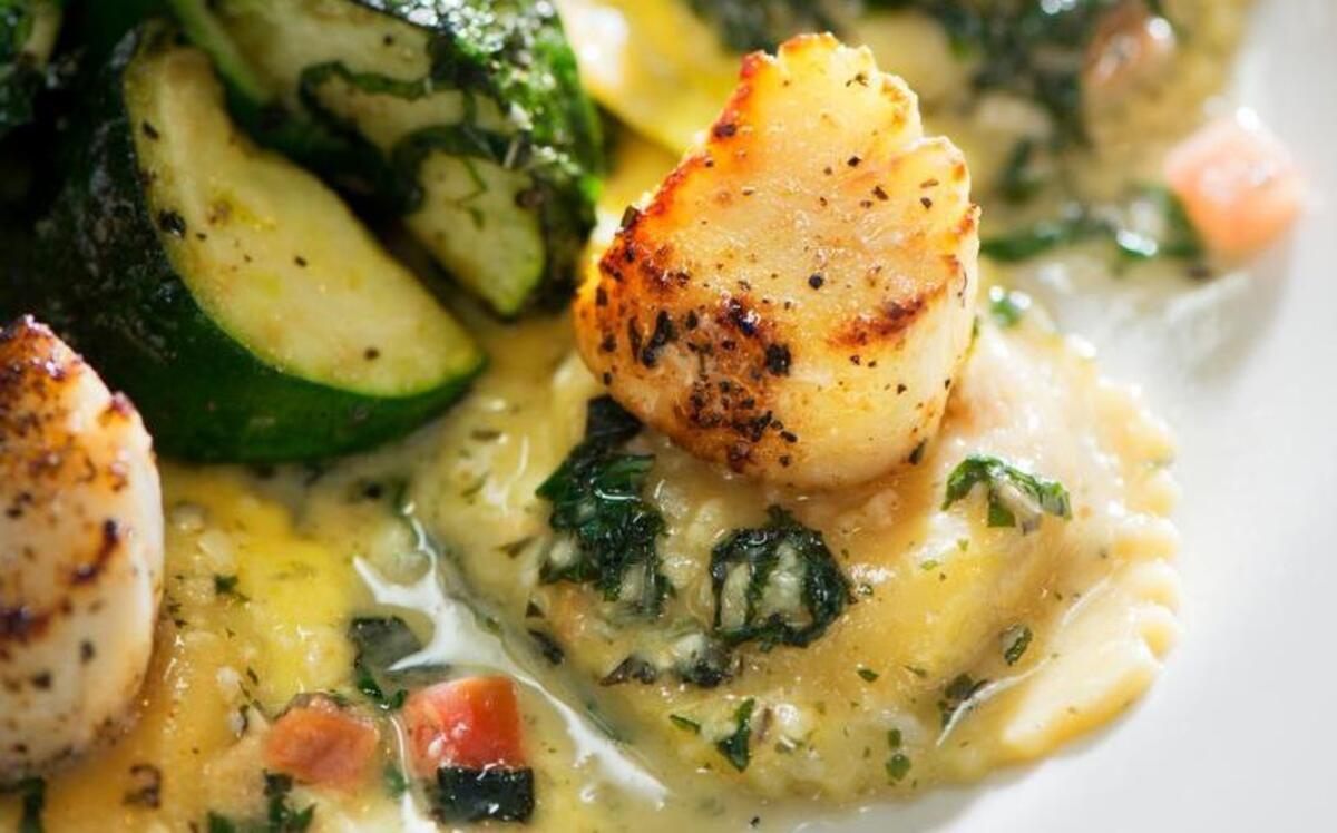 Duke’s Chowder House has a number of Alaska weathervane scallop specials on the menu begining Nov. 12, including this dish composed of scallops and ravioli.