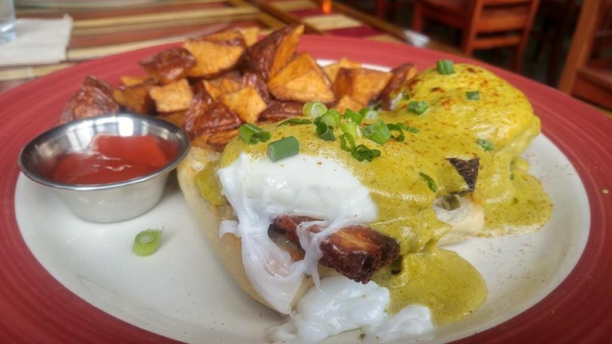 The Benedict at The Matador Tacoma comes with poached eggs, pork belly and a poblano cream sauce.