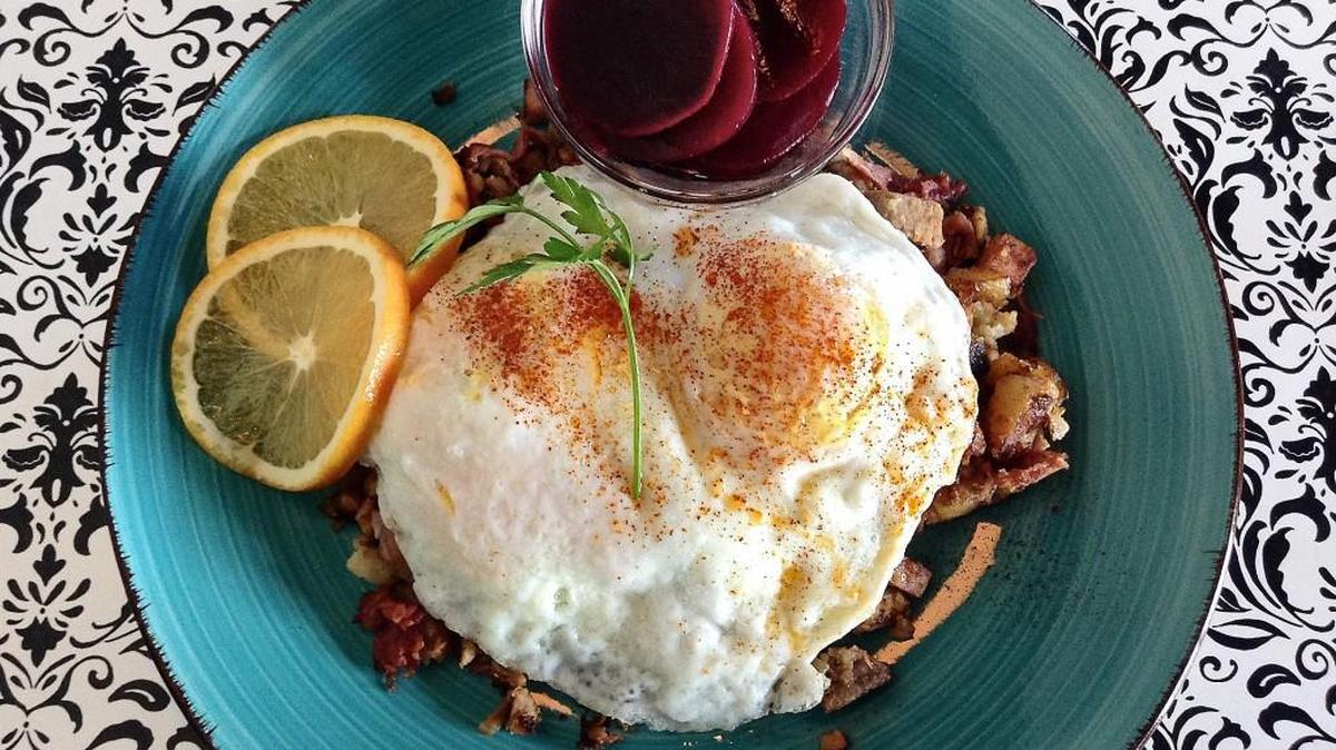 The Swedish breakfast dish at the Landmark Restaurant is called pytt-i-panna, a breakfast hash combining potatoes, onions, mustard and a variety of meats.