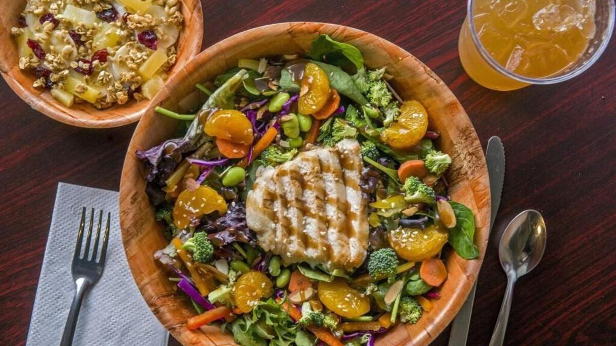 A Temple salad with an Energy Bowl on the side at Garden's Gourmet Salads in East Tacoma.