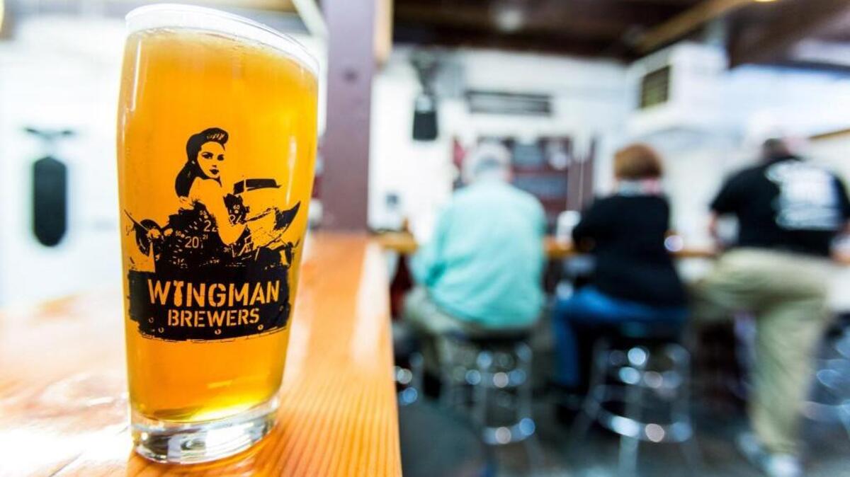 A pint of beer on the counter at Wingman Brewers. The Tacoma brewery is turning five this month and will have a party to celebrate at its Tacoma Dome neighborhood brewery.