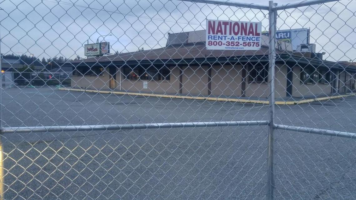 A construction fence has gone up around the old Krickett’s Family Restaurant space. MultiCare has purchased the property for future development.