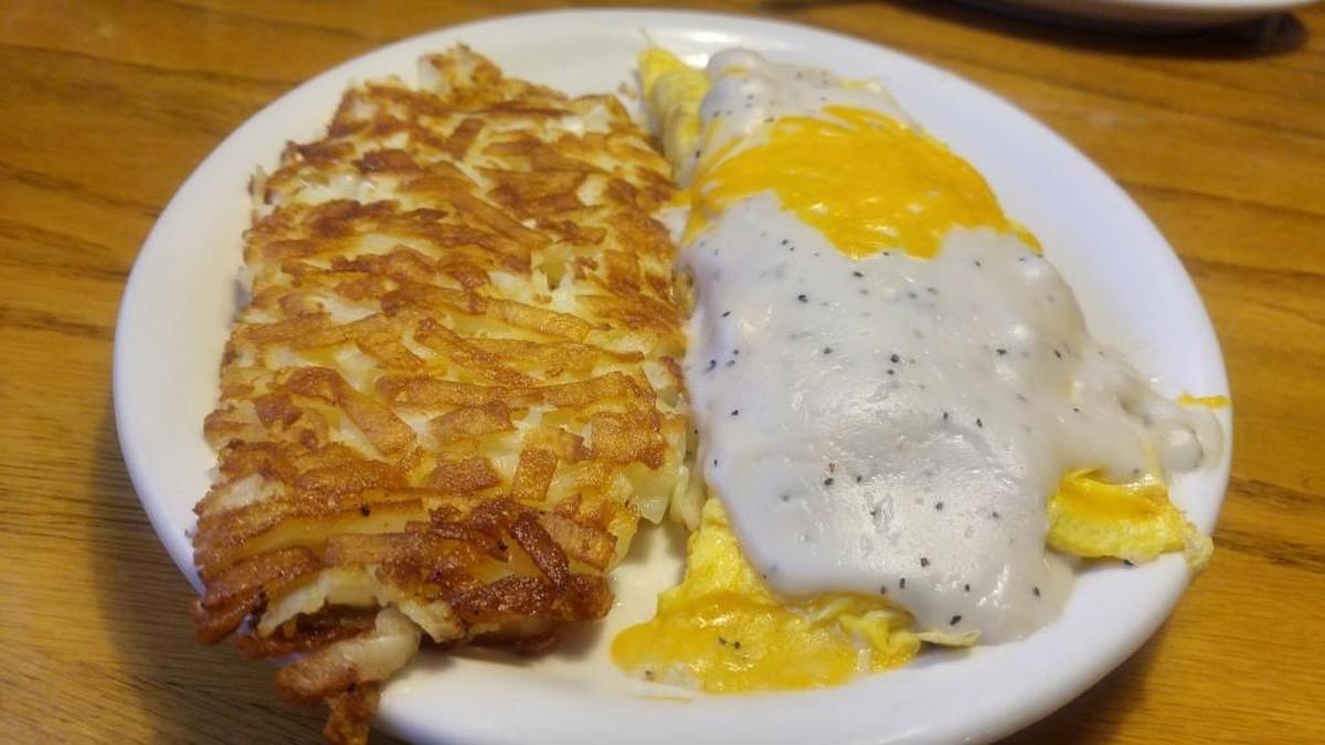 A chicken fried steak omelet wanted a bit more gravy to help the flavor.