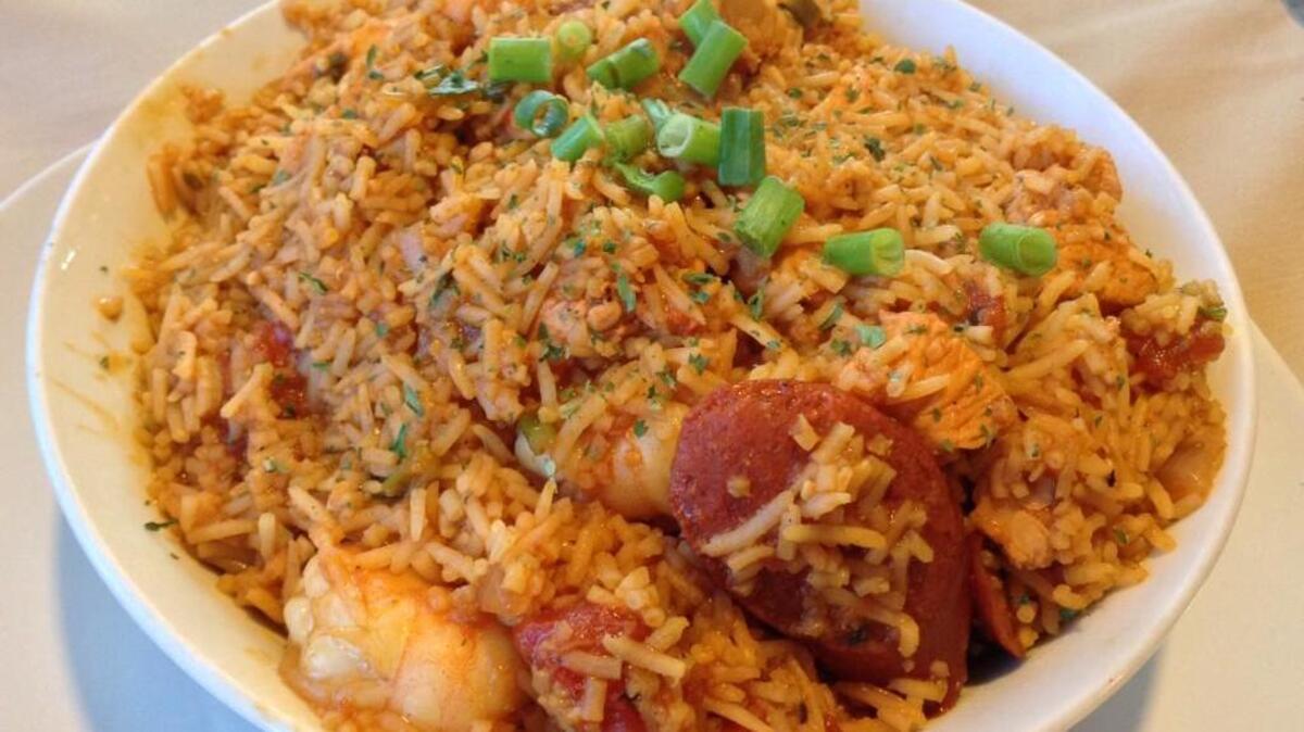 A plate of jambalaya with sliced hot links, shrimp and chicken from Soul, which recently opened near University Place.