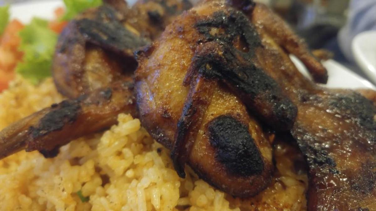 Split-and-roasted quail came with a tasty five-spice glaze.