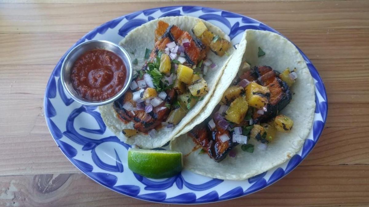 Al pastor tacos are one of eight kinds of tacos served at Casco Antiguo. The tacos are served a la carte as duos.