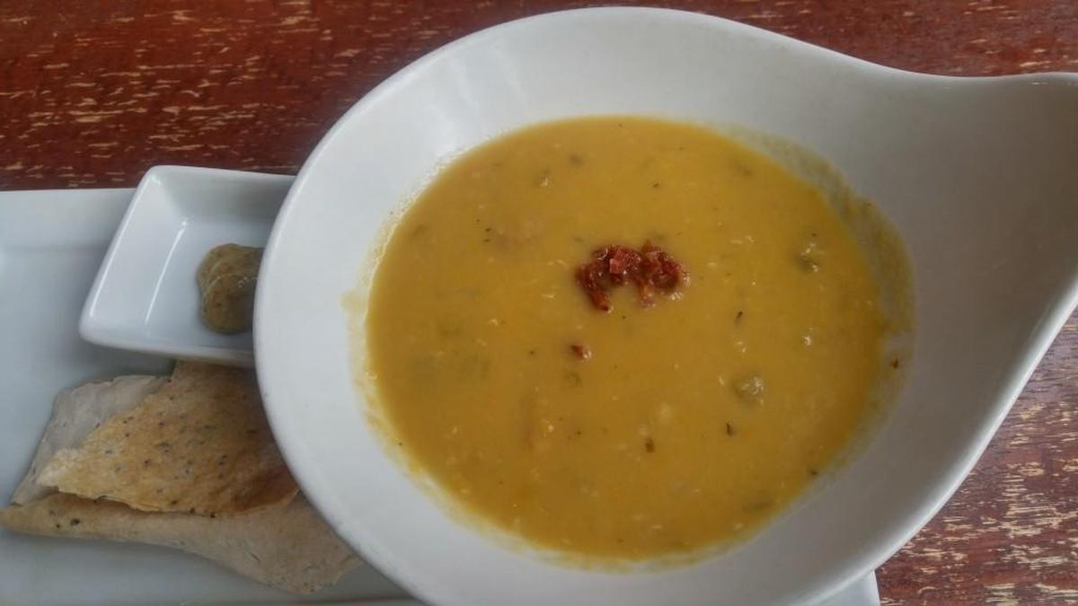 Pea soup with a garnish of bacon at 208 Garfield.