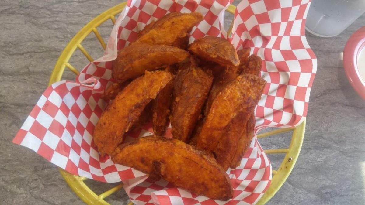Jojo potatoes are a specialty at Anglea’s. They’re served with a flavorful sour cream dip.