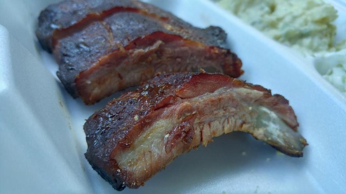 Baby back ribs from Rib Ticklers comes with a choice of sauces, which are served on the side.