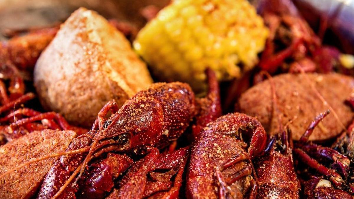 Crawfish in a cajun sauce with what chef Minh Phan calls a triple play (potatoes, corn and sausage).