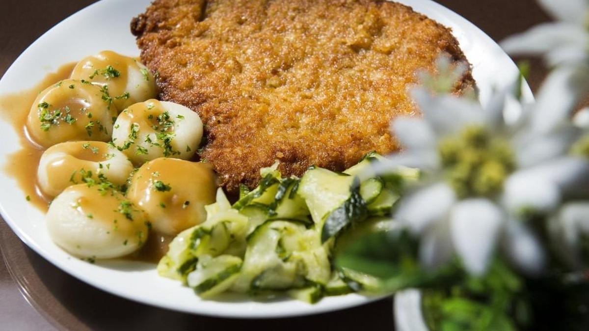 Bruno’s schnitzel with potato dumplings and cucumber salad at Bruno’s European Restaurant in Lakewood.