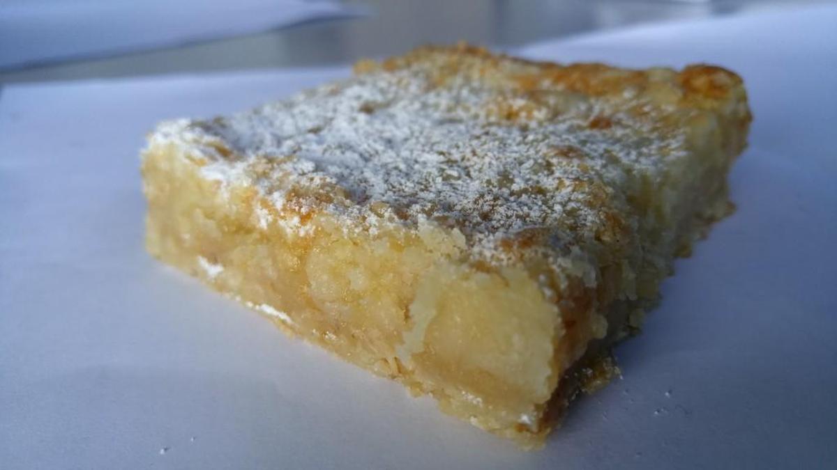A lemon bar from The Tattered Apron Bakery.