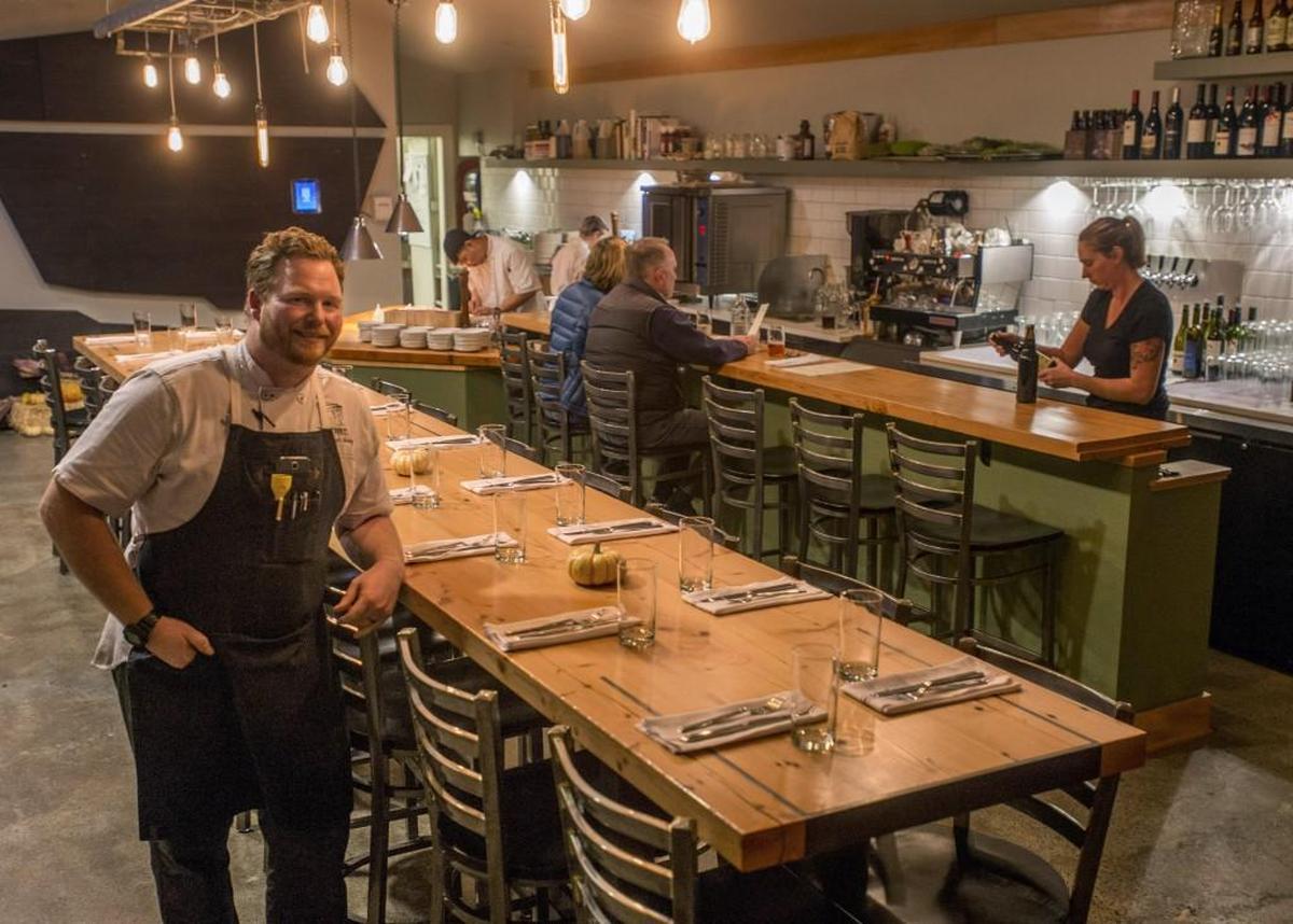 Bray at the restaurant’s namesake communal table, not long after it opened in 2015.