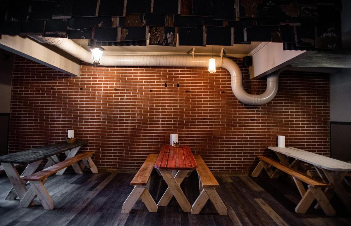 A shot of some tables in the dining room of Brimstone PNW Smokehouse in Gig Harbor.