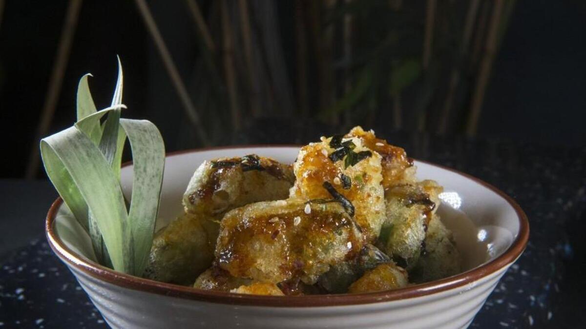Brussels sprouts tempura at Sushi Ari in Puyallup are battered in a fluffy tempura coating, deep fried, then coated with a sticky glaze. They’re also on the menu at Tacoma’s TheKoi.