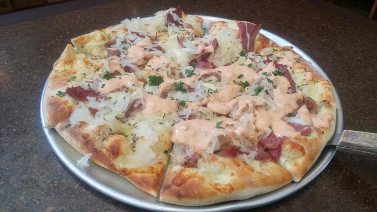 The Reuben pizza with corned beef is a March-only special at Farrelli’s Wood Fire Pizza restaurants.