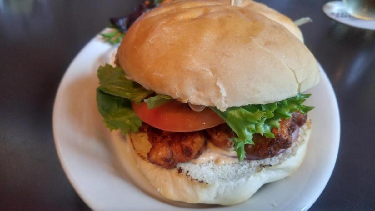 The fried cauliflower sandwich at The Swiss Tavern is tempura-fried cauliflower with a vegan aioli.