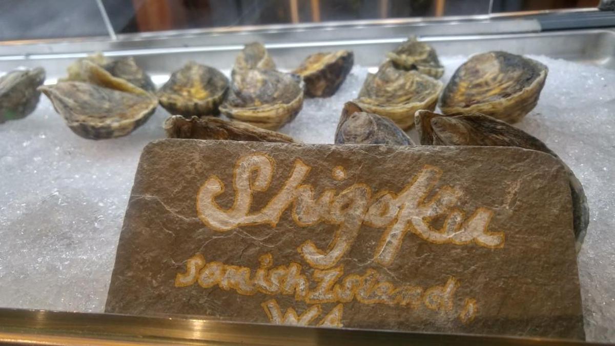 Find the day’s selection of oysters behind a case at the bar at Fish Brewing Pub and Eatery.