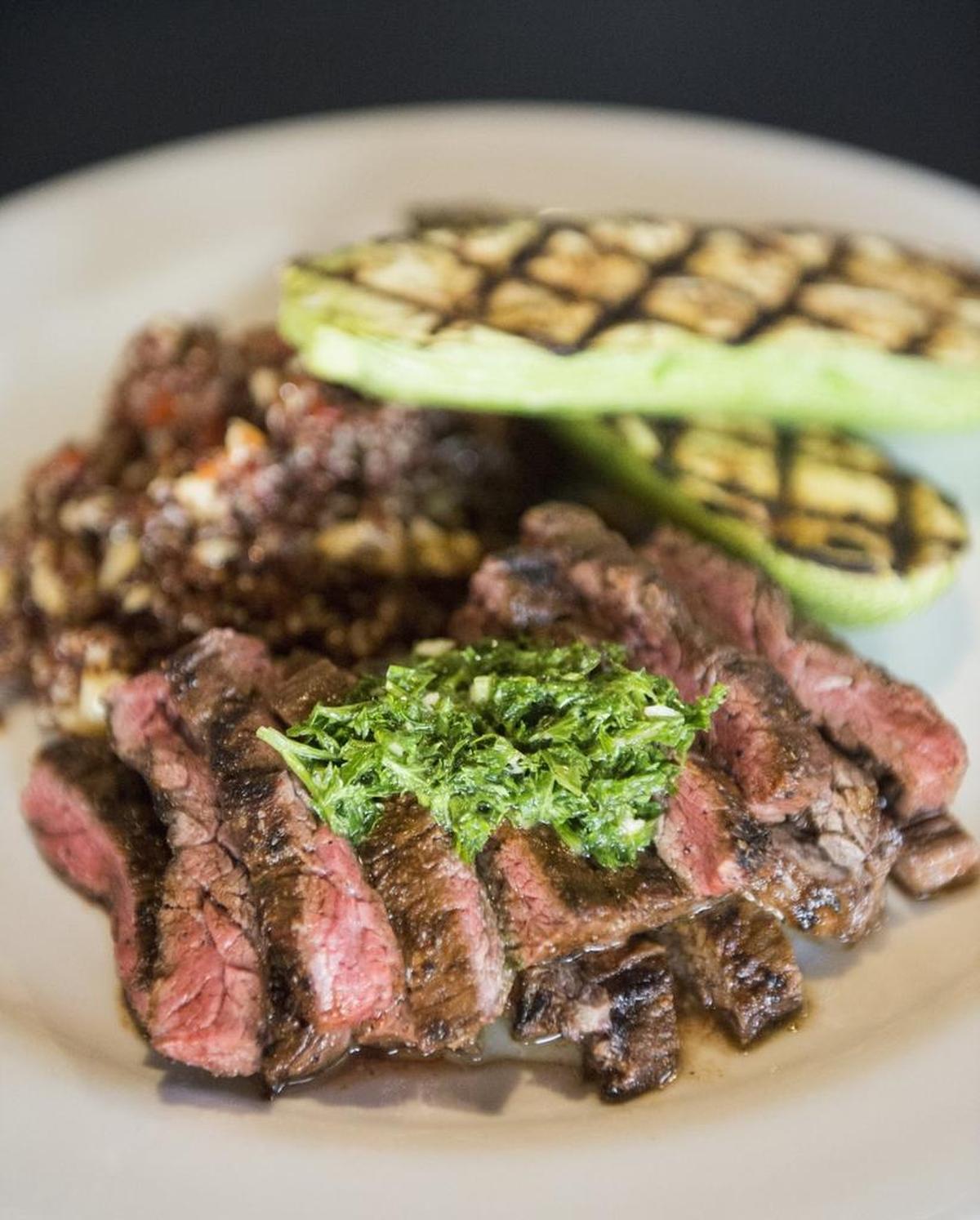 Carne Asada with garlic and roasted red pepper quinoa and grilled Mexican squash at Carne Aqui in Parkland.
