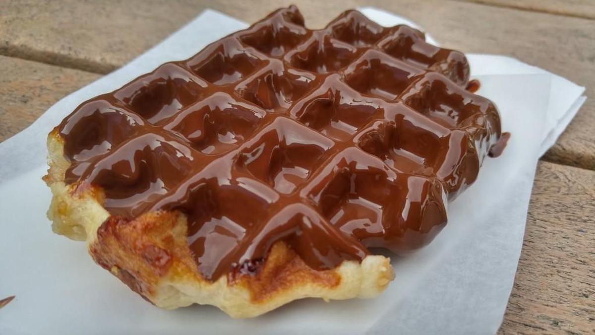 A chocolate-dipped waffle from La Waffletz and Macaron Station.
