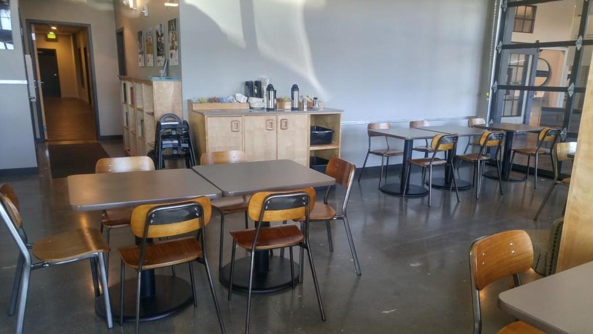 Seating comes with schoolhouse-style chairs at Top Pot Doughnuts in the Proctor neighborhood.