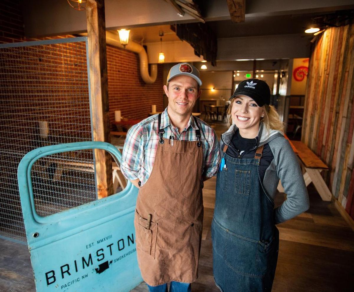 Chefs Will Rieck, left, and Austin Nolan, right at Brimstone PNW Smokehouse in Gig Harbor.