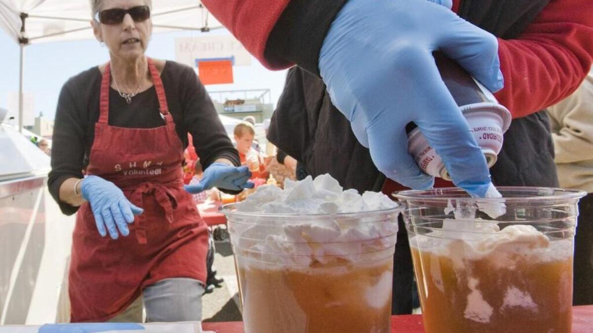 They couldn't produce apple-cider floats fast enough at the annual Steilacoom Apple Squeeze, October 6, 2013.