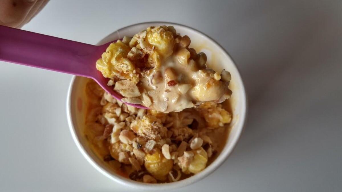 A bite of a Cracker Jack themed sundae at Ice Cream Social in Tacoma.