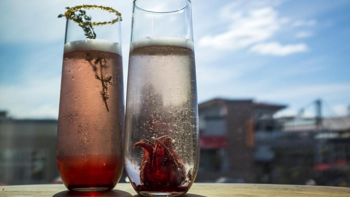 The Klimt (left) and O’Keefe cocktails, designed by Kerry Cole of the Blue Octopus Champagne Bar.