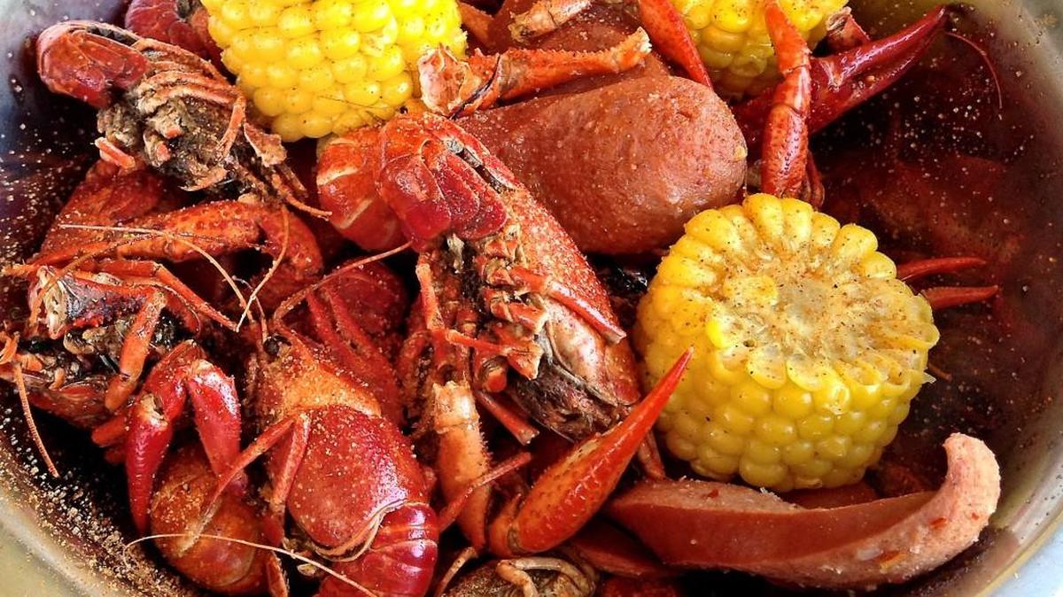 Crawfish boil is served at the newly opened Dragon’s Crawfish in Tacoma’s Lincoln neighborhood. A variety of spices are available to flavor the dish and there’s bread on the side for sopping up the broth. Seafood is served by the pound.