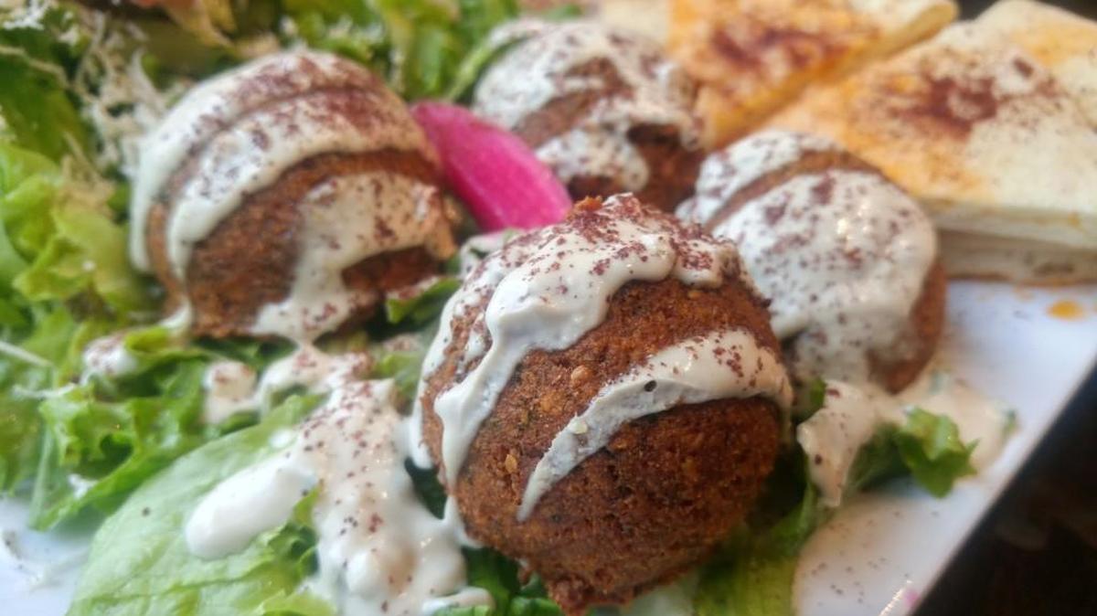 Falafel, a dish of fried ground garbanzo beans, is one specialty at newly opened University Place Mediterranean Gyro Grill. The restaurant also has a location in Federal Way.