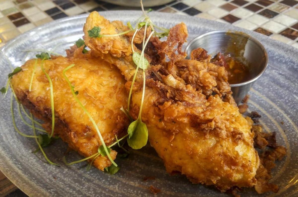 Chicken, cooked in a sous vide and then fried to order, was a specialty at Wilder.