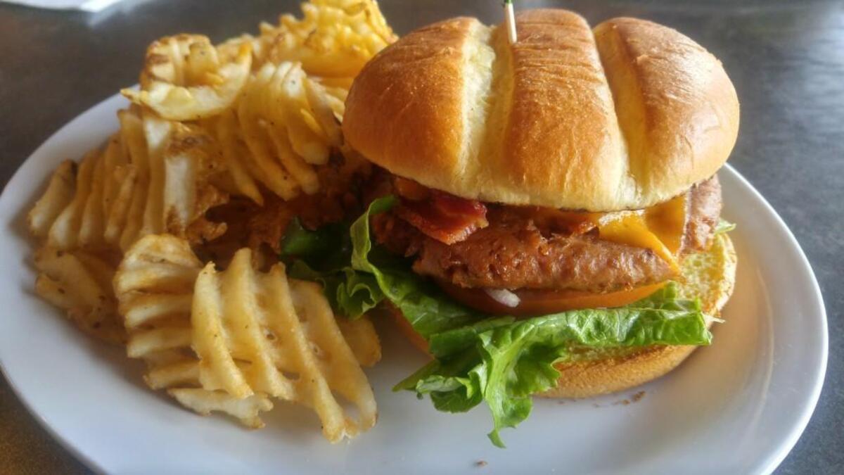 The Hob Nob house burger with bacon and a substitute of a Beyond burger.