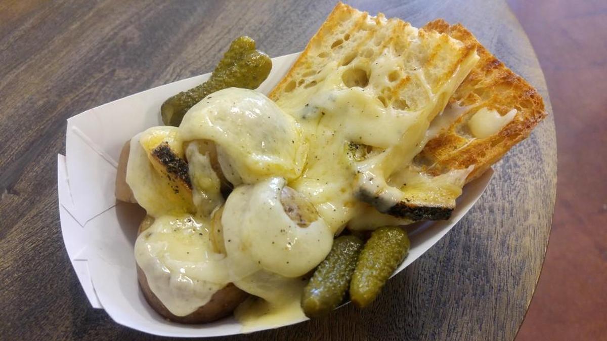 Find raclette, a Swiss dish of creamy melted cheese with bread, potatoes and pickles, at My Cheese Shoppe in downtown Puyallup.