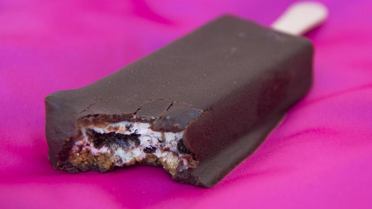 A cookies-and-cream cheesecake bar is one of Danelle Bentley’s products for her company, Tacoma Cheesecake Co. She has just opened a cheesecake kiosk at the South Hill Mall.