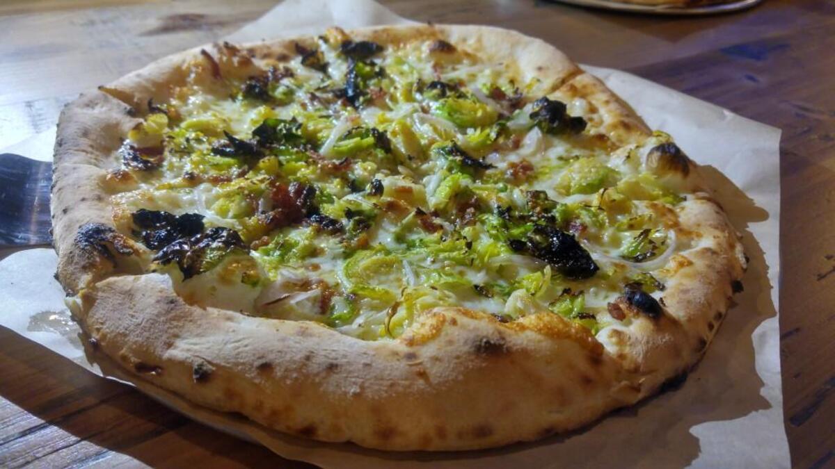 A Brussels sprouts pizza with bacon and truffle oil at The Carlson Block in Wilkeson.