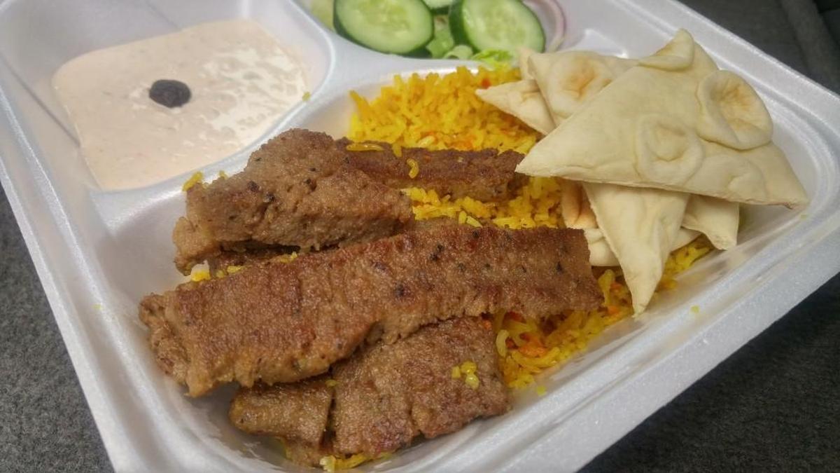 The gyro platter at Infinium stop comes with rice, pita, salad and sauce.