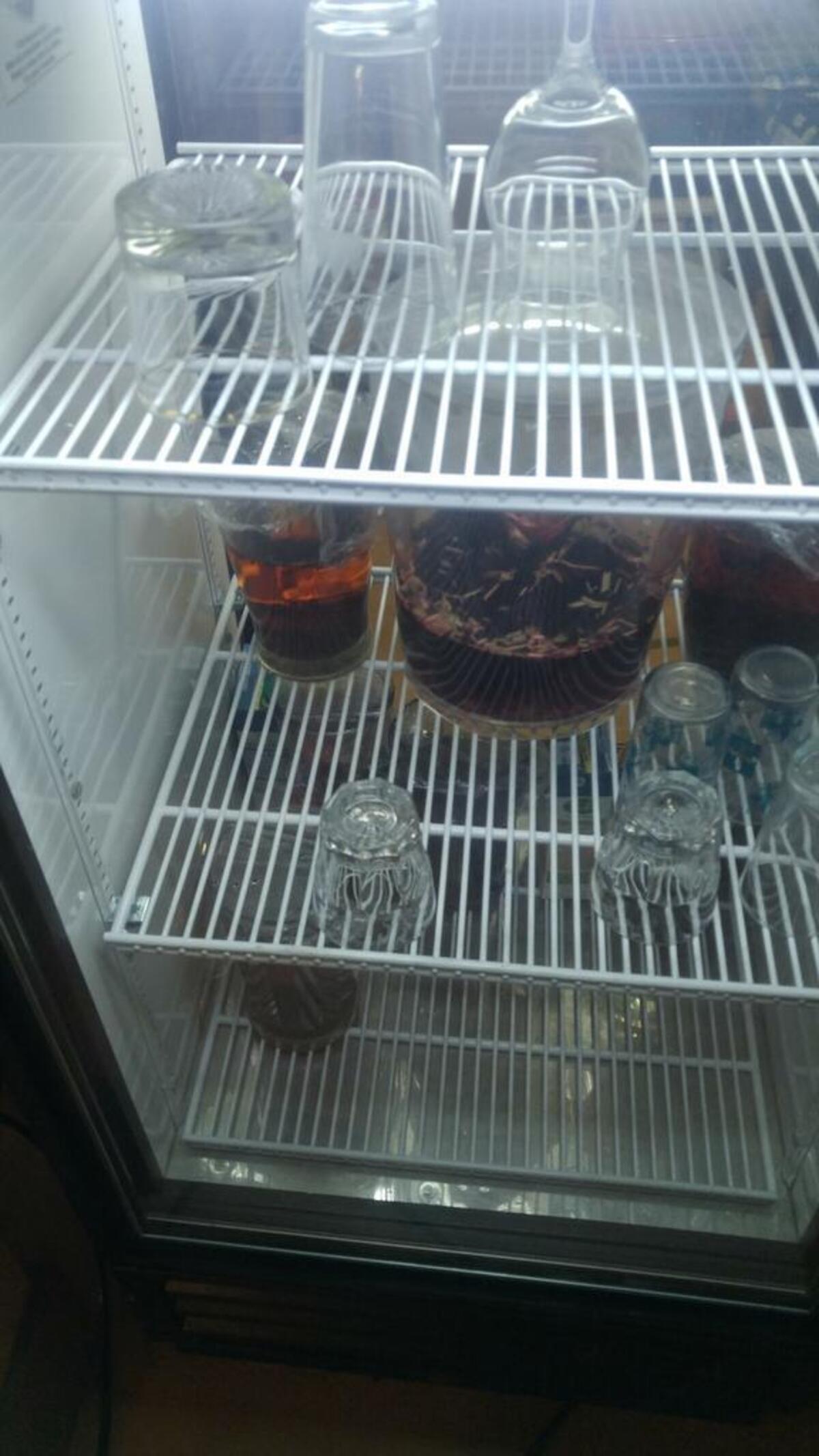 The fridge holds about a half dozen cold-brewed tea choices at Mad Hat Tea in downtown Tacoma. As a bonus, the tea is served in chilled glasses.